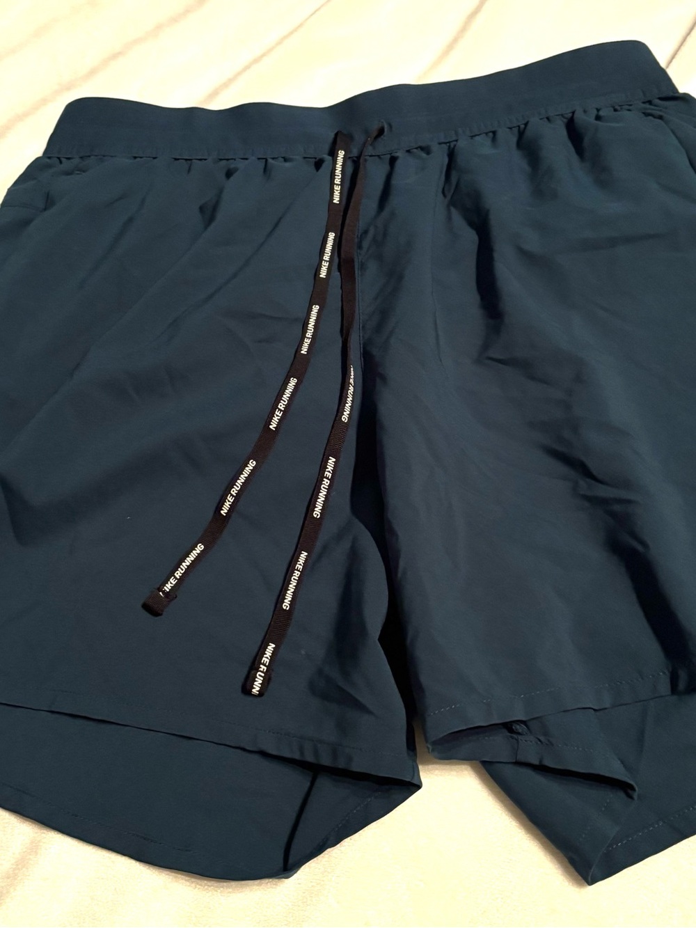 Nike Dri-FIT Running Shorts Women’s M Blue Reflective Lined Zip Pocket